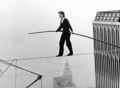 Frenchman Philippe Petit was arrested immediately after his successful tightrope crossing between the Twin Towers in New York - around 1,350 feet off the ground - on 7 August, 1974.