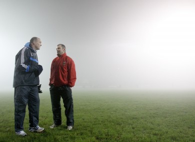 Dublin manager Pat Gilroy and Mayo manager James Horan talk after last month's game was called off at half-time due to poor visibility.