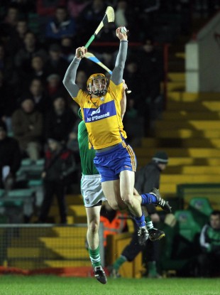 John Conlon beats Limerick's David Moloney to a high ball.