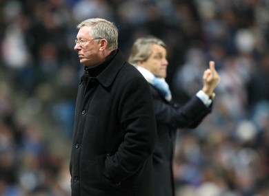 Face off: Alex Ferguson and Roberto Mancini.