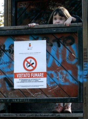 A sign in Italy reads: no smoking in the presence of infants and children including 12-year-olds, and of pregnant women.