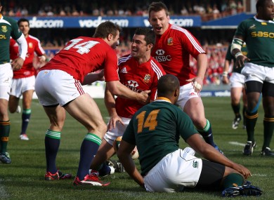 Rob Kearney is congratulated by Tommy Bowe after a try against South Africa in 2009.