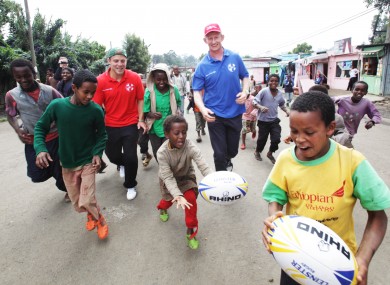 Ian Madigan and Leo Cullen with some Ethiopian children is Adiis Ababa.