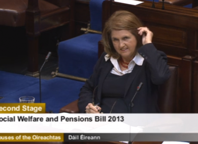Joan Burton listening to opposition TDs in the Dáil today