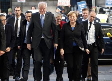 German Chancellor and chairwoman of the Christian Democratic Union (CDU), Angela Merkel, front right, and the chairman of the Christian Social Union (CSU), Horst Seehofer, front left.