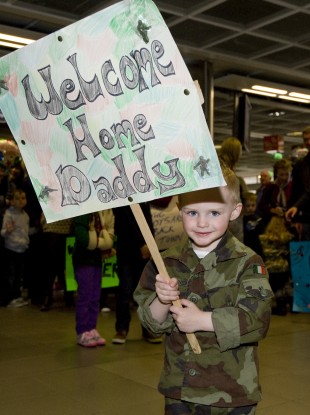 2-year-old Ben Naughton, from Galway, waits for his father to return home from Lebanon in May.