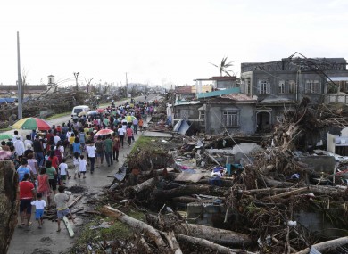 Typhoon survivors take part procession for the victims in Palo township, Leyte province