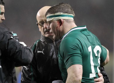 Brian O'Driscoll gets medical assistance after a suspected concussion against France in March.