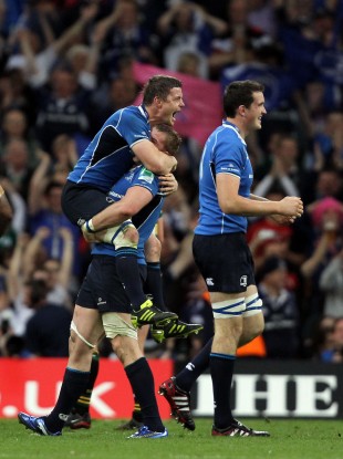 Brian O'Driscoll leaps on teammate Jamie Heaslip after defeating Northampton in 2011.