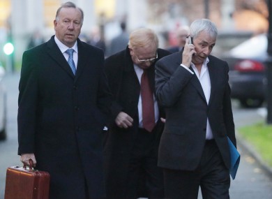 CRC director David Martin (lefft), chairman James Nugent (centre behind) and former CEO Paul Kiely (right) leaving Leinster House earlier this month