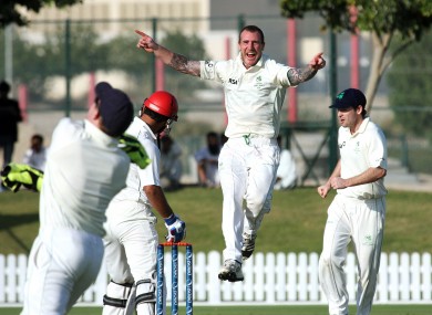 Ireland's John Mooney leaps with delight after dismissing Nawroz Mangal of Afghanistan.