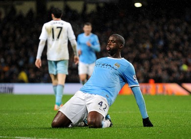 Yaya Toure celebrates scoring for Manchester City last night.