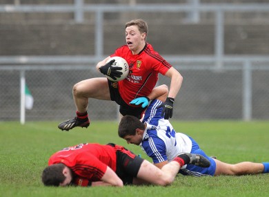 Down's Jerome Johnston in action with Monaghan's Drew Wylie.