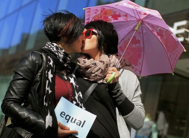 Maria Nugent (left) and Denise Morrisey kiss outside the Gaeity Theatre in Dublin in April 2012 as part of a demonstration for equal rights.