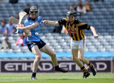 Conor Delaney tries to get a block in on Dublin's Eoghan McHugh.